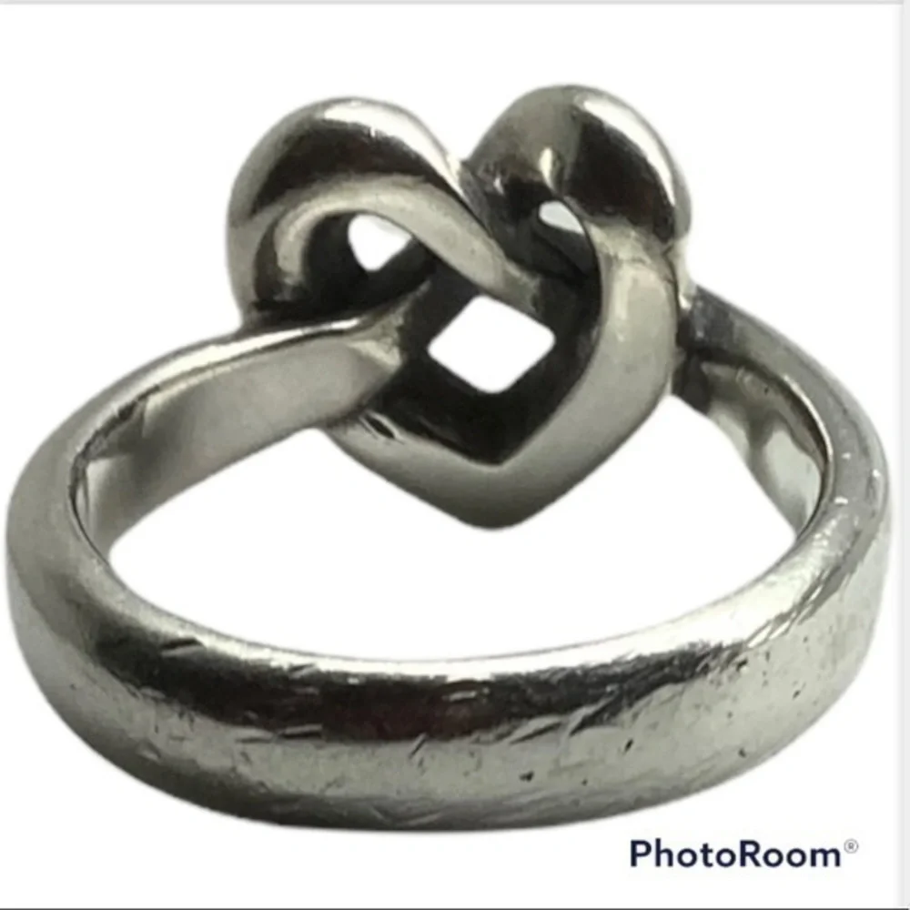- James Avery sterling silver heart shaped ring